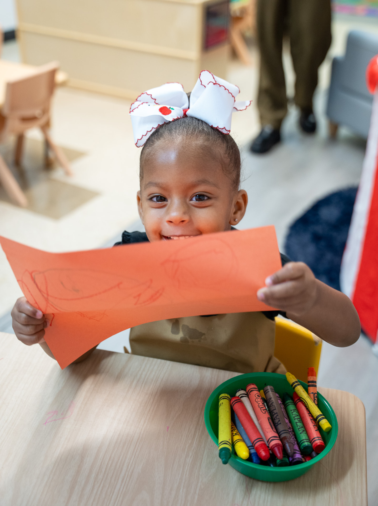 A-Learner engaged in arts and crafts at The Early Learning Institute